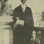 Black and white photograph of a man with a tophat
